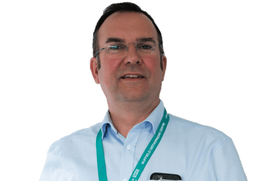 Experienced surgeon Dr. Tom Cosker at Insight Surgery specializing in advanced surgical procedures.